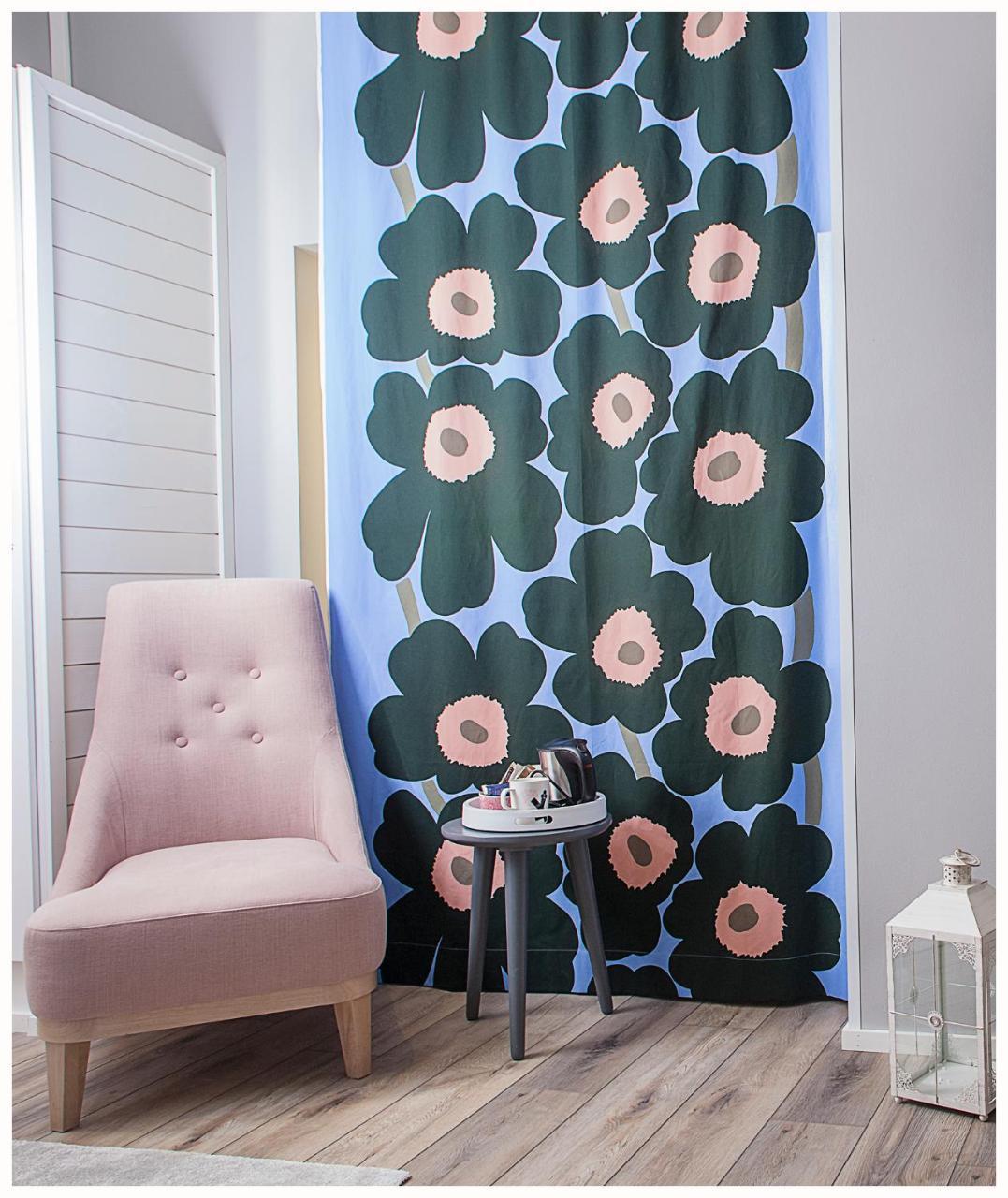 Crystal Arctic Suites โรวานิเอมิ ภายนอก รูปภาพ Marimekko curtain